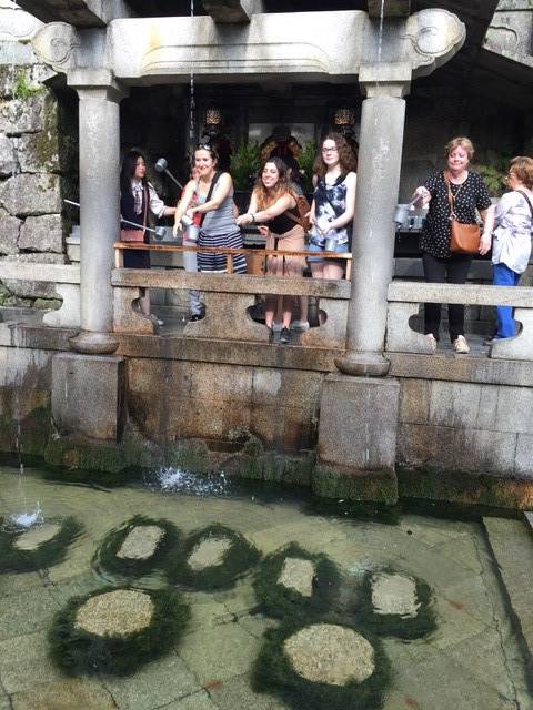 Students posing at Kiyomizu temple in Kyoto